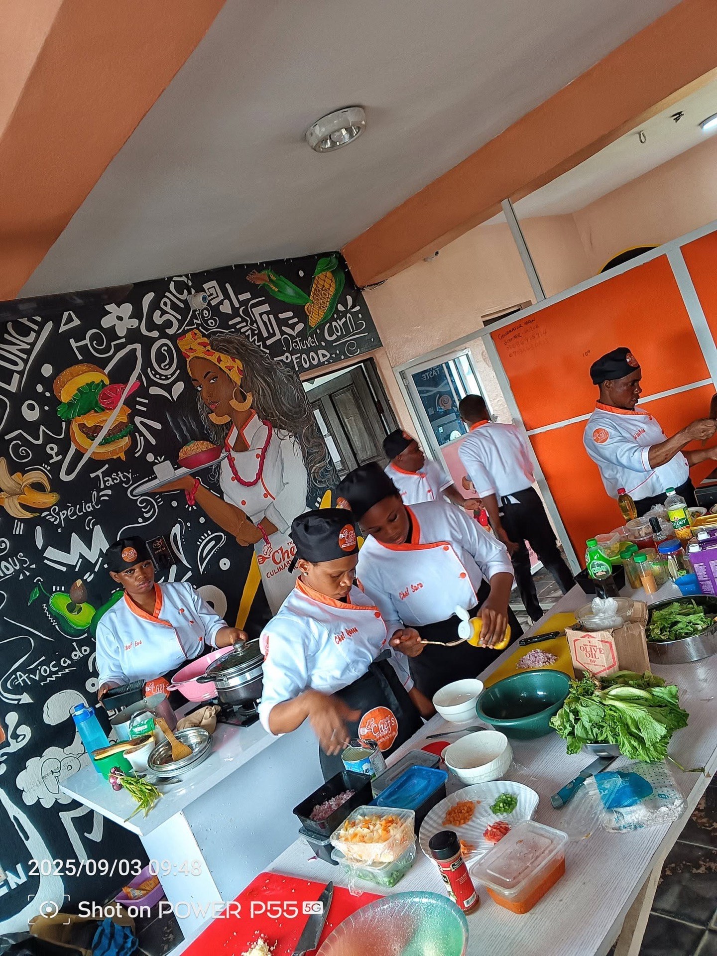 Students cooking in a practical class