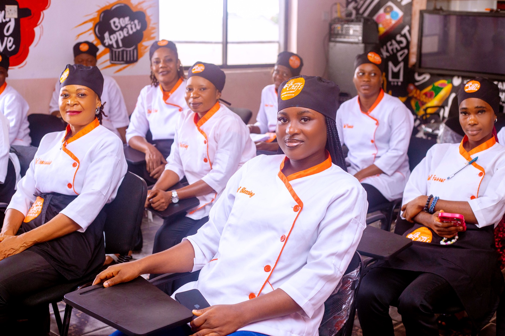 A cohort of chefs at a class session